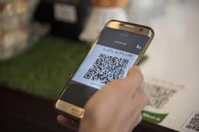 Consumers can use the standard QR code to make payments with a smartphone. Photo courtesy of Kasikornbank