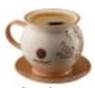 커피, 커피잔, 컵이(가) 표시된 사진자동 생성된 설명